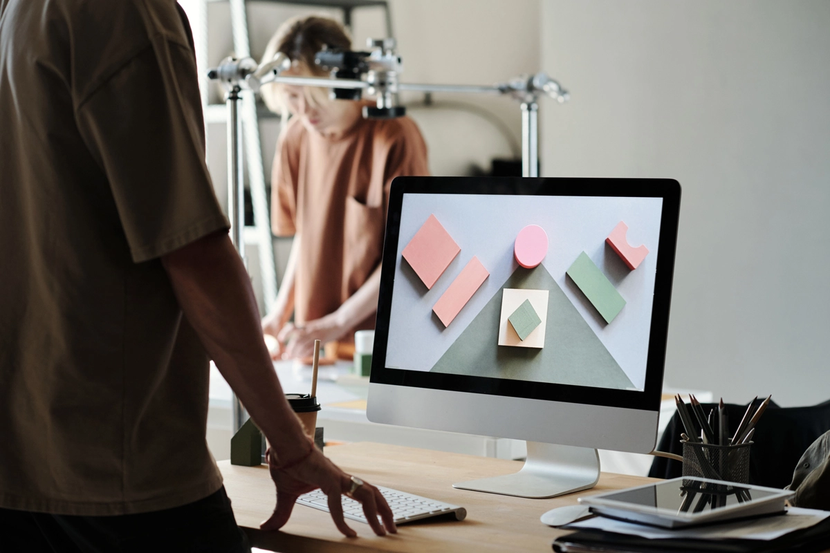 Designers working on computers